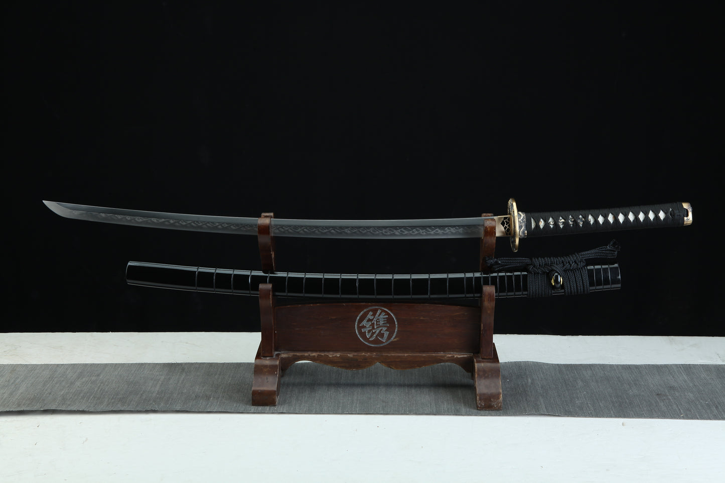 Complete Jaryū 邪龍 Evil Dragon katana 39.3 inches total length showing traditional Japanese sword construction with black lacquered scabbard