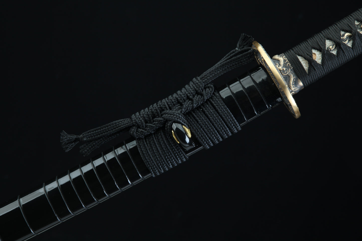 Sword with a black sheath on a dark background