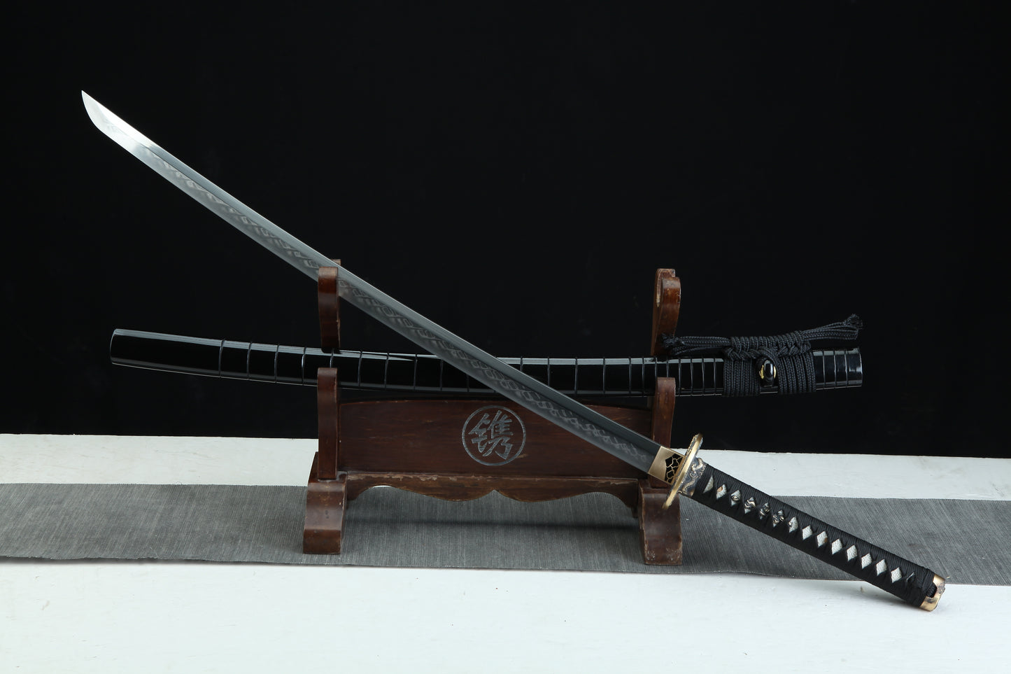 Complete Jaryū 邪龍 Evil Dragon katana 39.3 inches total length showing traditional Japanese sword construction with black lacquered scabbard