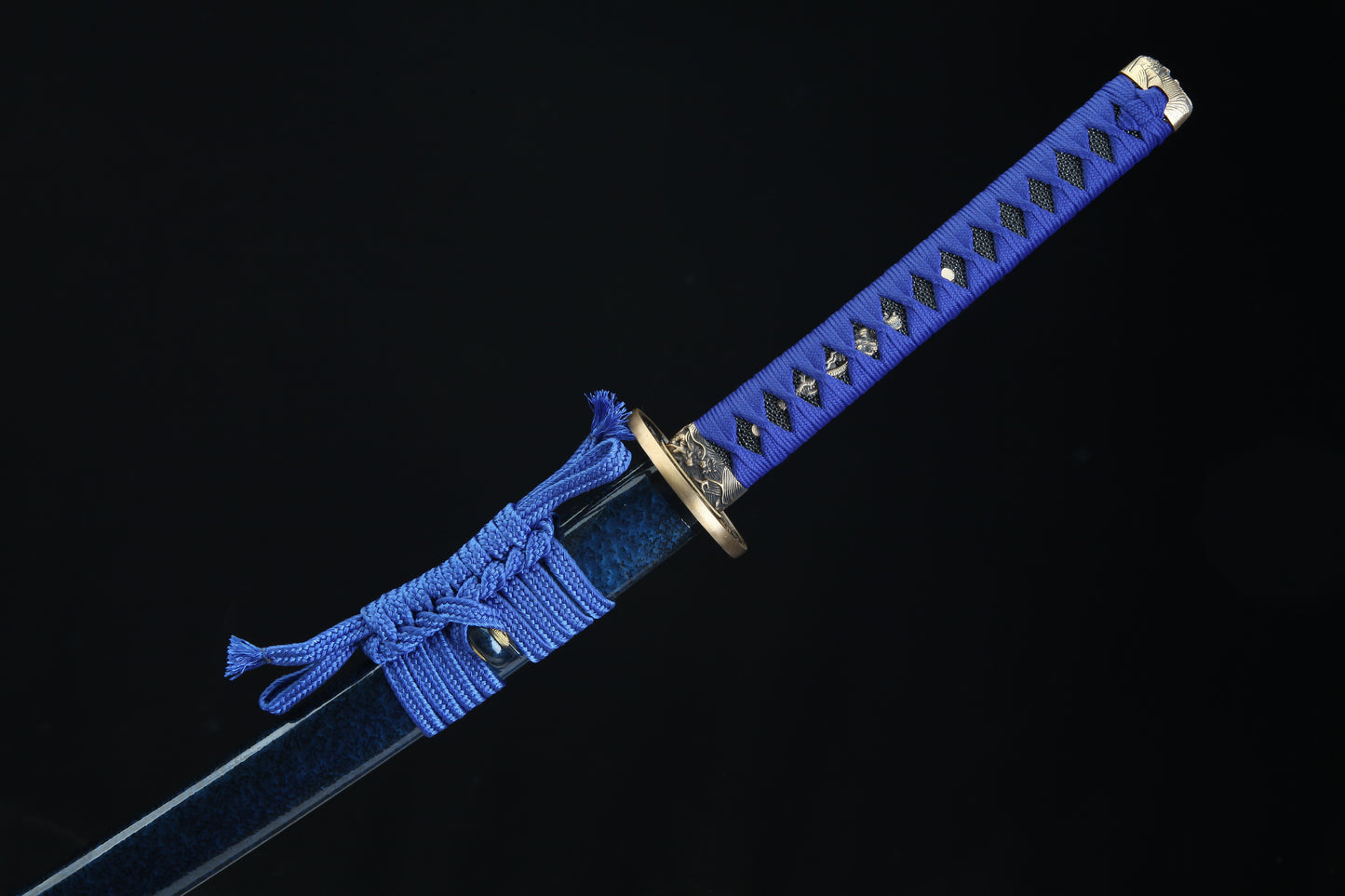 Sword with blue sheath on a black background