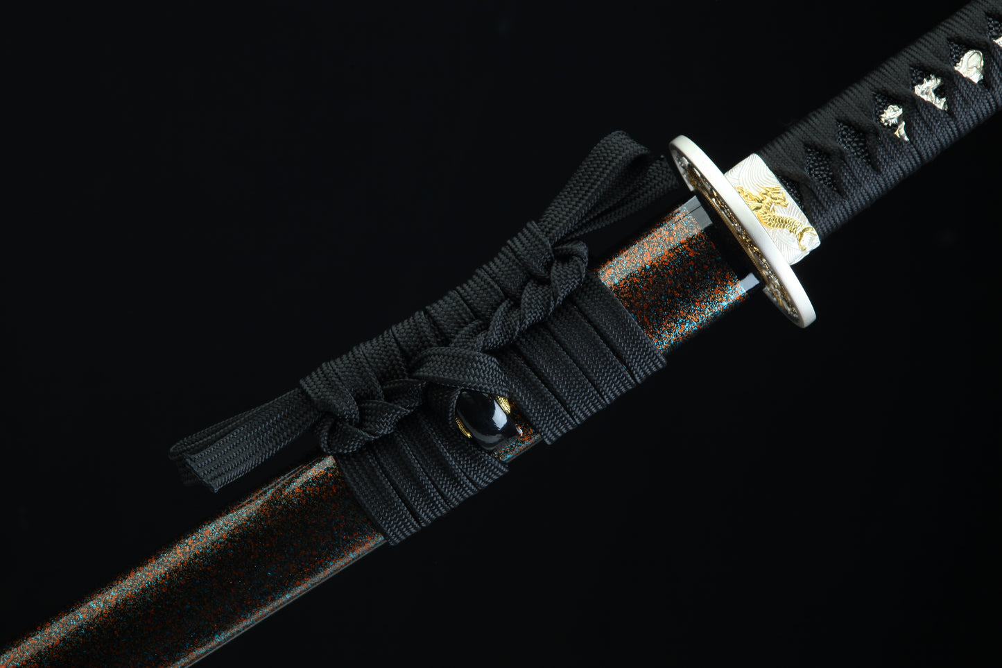 Sword with a black sheath on a dark background