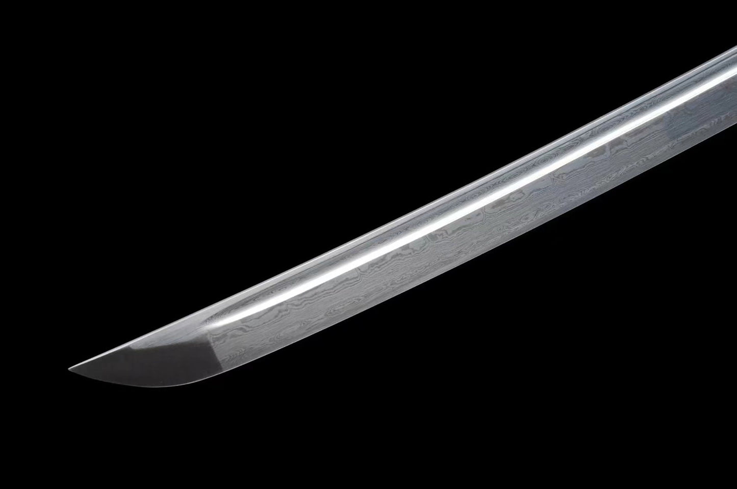 a large knife with a long blade on a black background