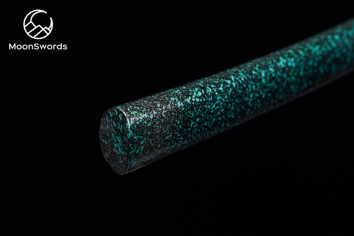 a close up of a baseball bat on a black background