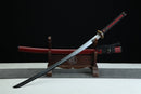 Fuun Katana with red shealth and black cording on a wooden stand against a black background