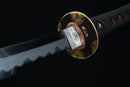 Close-up of the golden Tsuba, or handguard of Fuun Katana