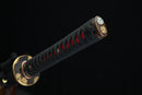 Close-up of the golden Tsuba, or handguard of Fuun Katana