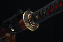 Close-up of the golden Tsuba, or handguard of Fuun Katana