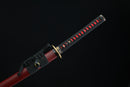 Fuun Katana inside of a red shealth against a black background