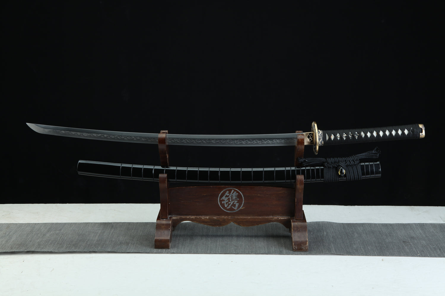 Complete Jaryū 邪龍 Evil Dragon katana 39.3 inches total length showing traditional Japanese sword construction with black lacquered scabbard