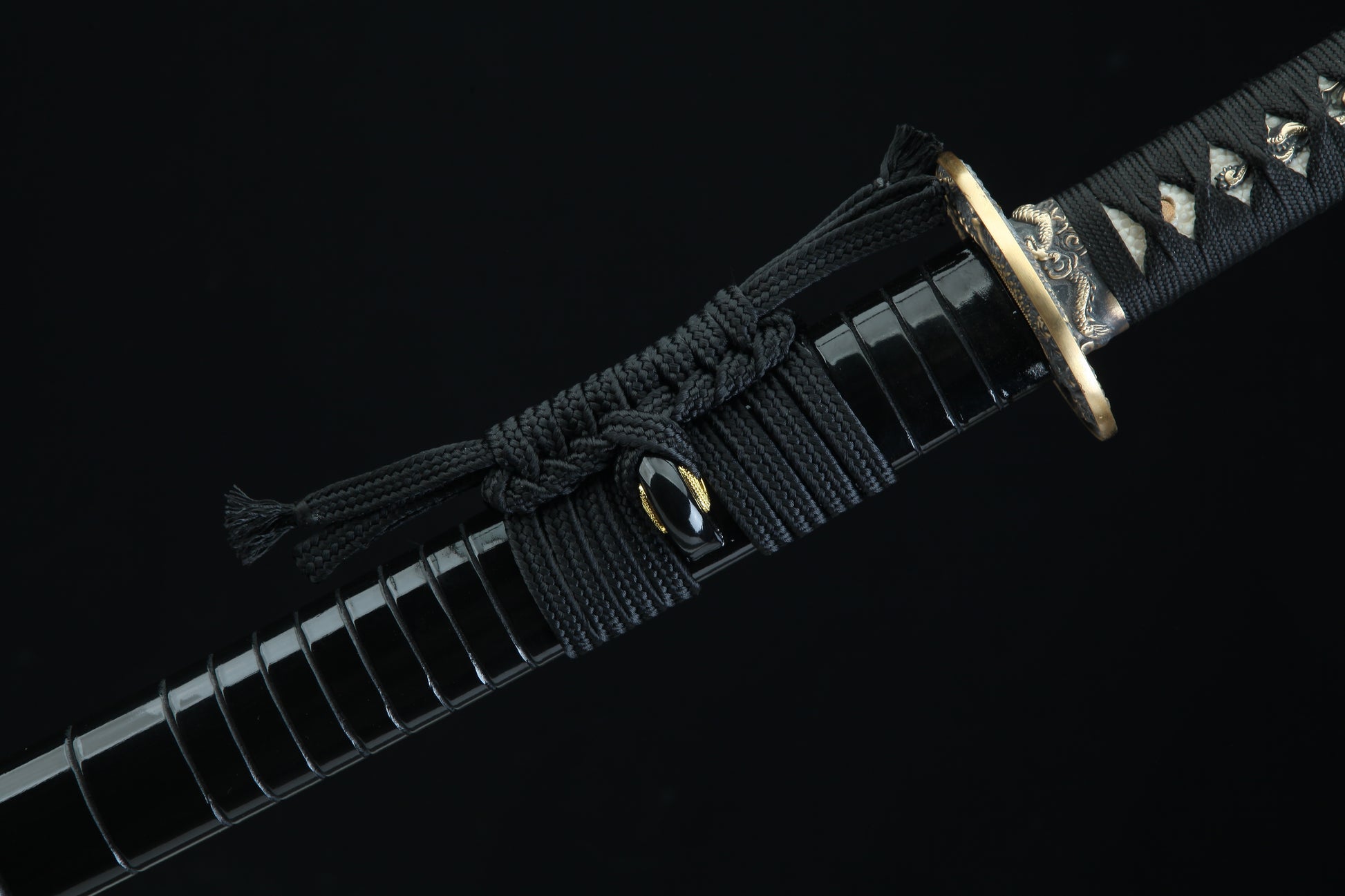 Sword with a black sheath on a dark background