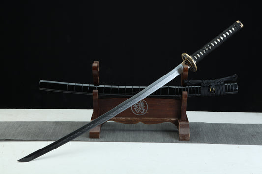 Sword on a wooden stand with a dark background