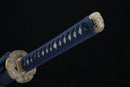 Navy blue cord-wrapped tsuka handle of Sōō katana with authentic fish skin samegawa and bronze menuki fittings