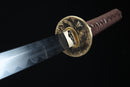 Sword with a detailed hilt on a black background