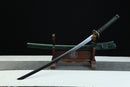 Sword on a wooden stand with a black background