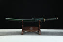 Sword on a wooden stand with a black background