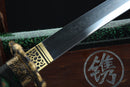 Decorative sword with gold hilt on a dark background