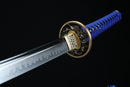 Sword with blue handle and gold guard on a black background