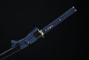 Sword with blue sheath on a black background