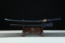 Blue Katana with blue painted blade on a wooden stand against a black background