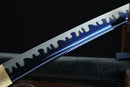 Close-up of a sword blade with a dark background