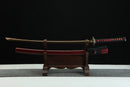 Sword on a wooden stand with a black background