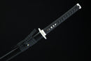 Sword with a black sheath on a black background