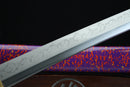 Sword with decorative blade and colorful handle on a dark background