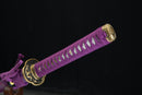 Purple sword sheath with gold accents on a black background