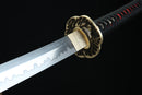 Sword with a decorative hilt on a black background