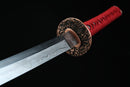 A photo of Moonswords Kafuun Katana with a red bronze guard, is shown against a black background.