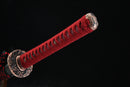 Close-up of the red bronze kashira, or the pommel cap of Nichirin katana