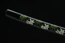A close-up view of Moonswords Kyochiku Katana, with a black shealth.