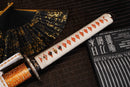A close-up view of Moonswords Nichirin Katana with orange shealth.