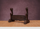 45 degree view of Rosewood Crane Sword Stands with two tiers