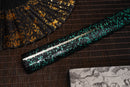 A close-up view of Moonswords Ryokuya Ichirin Katana with green shealth.