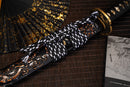 A close-up view of Moonswords Seima Guren Katana with black shealth.