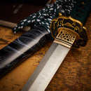 A photo of Moonswords Suiha Katana with a bronze guard, is shown against a map.
