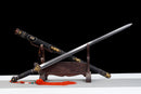 The Qianqing Sword on a wooden stand against a black background