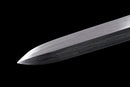 A close-up of the Hand-Forged Laminated Steel blade on the Qianqing sword against a black background