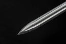 Close up of the Damascus steel blade of Yongle Emperor Sword against a black background