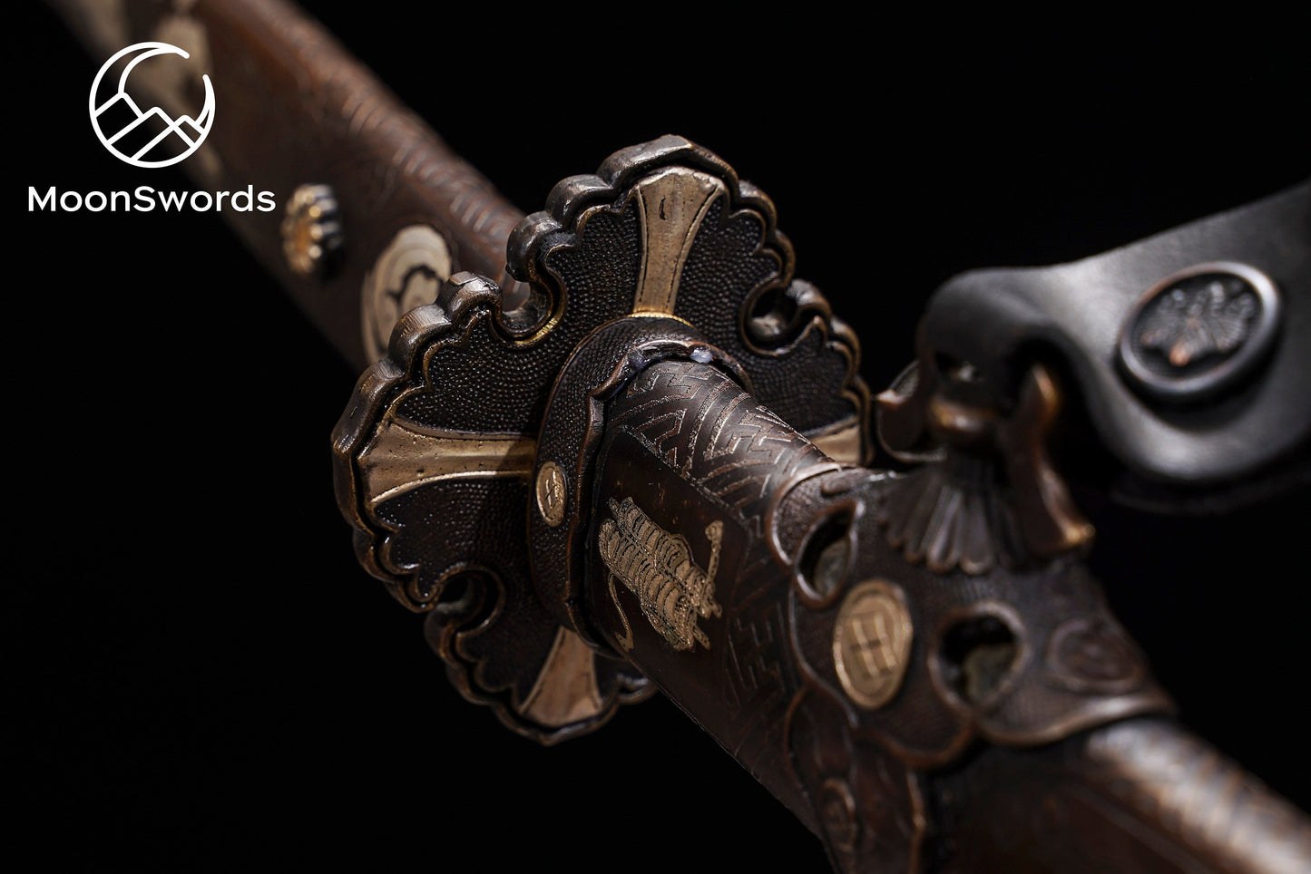 a close up of a metal object on a black background