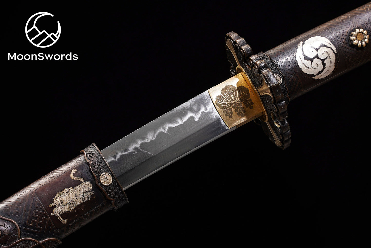 a close up of a knife on a black background