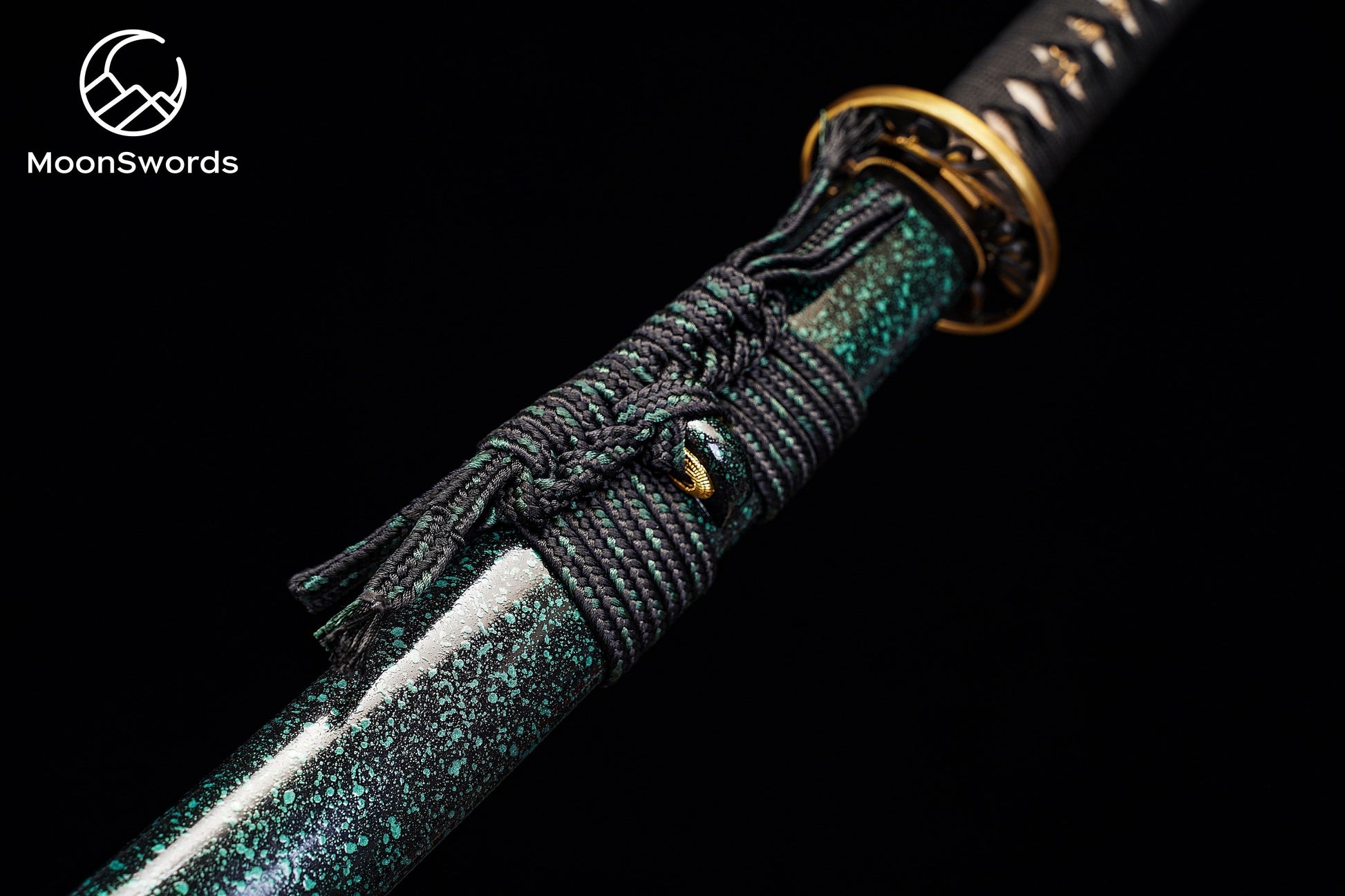 a close up of a sword with a black background